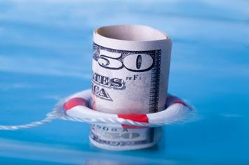 Dollar floating with lifepreserver-iStock_000008977090XSmall.jpg