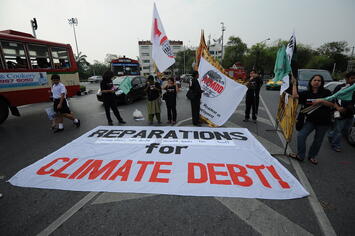 climate-reparations-protest_un.jpg